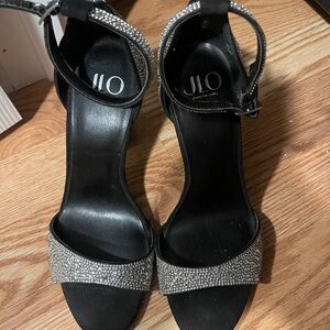 Jennifer Lopez Black Heels with Silver Accents